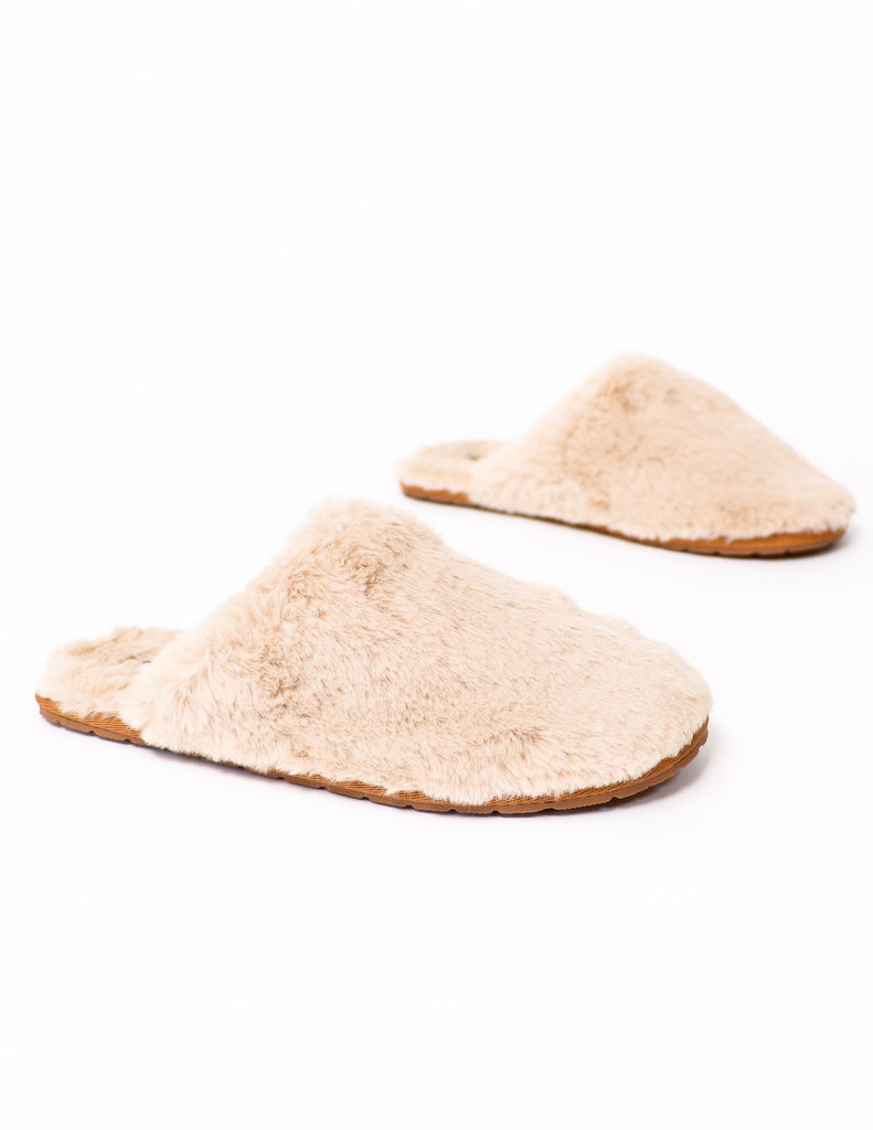 Close up of the natural fuzzy wuzzy slippers on white background