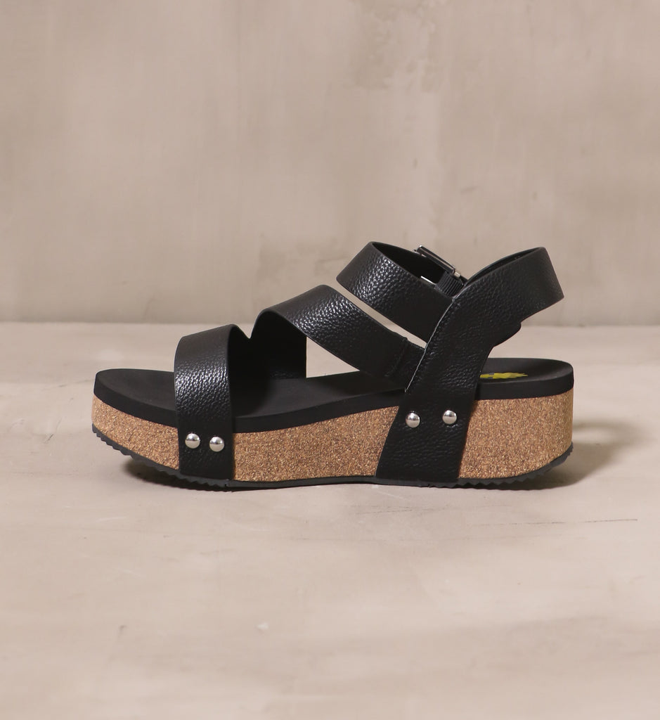 inner side of the all strapped in wedge with cork platform sole and black tread