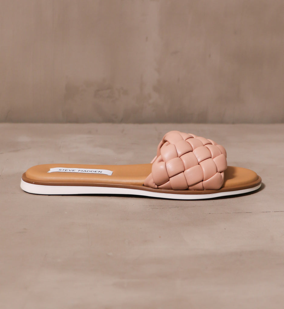 outer side of the blush crush slide with pink braided strap and white rubber sole