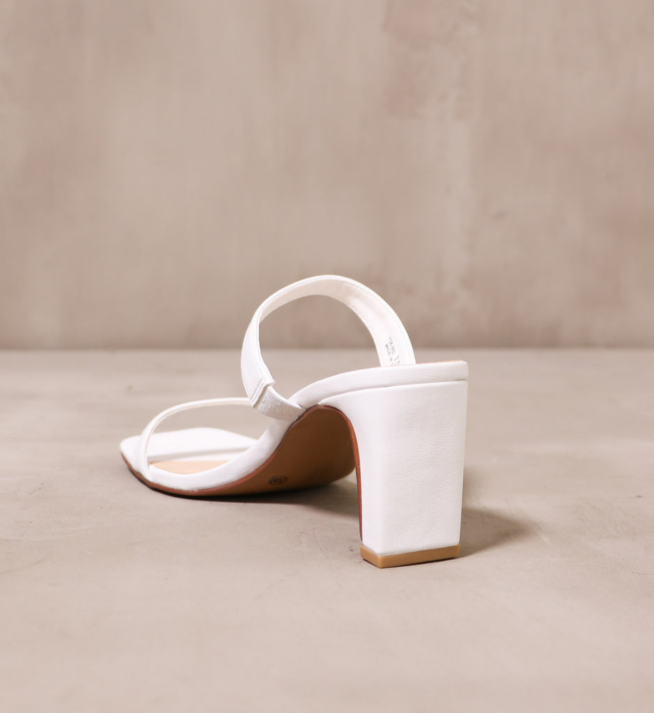 back of the rectangle block heel on the white french manicure heel