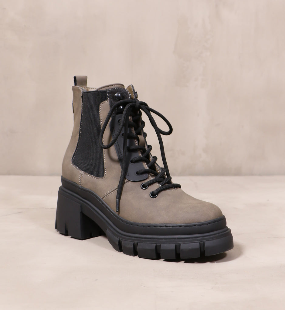 front of the round toe hike it or not boot with black lug sole and grey mushroom leather upper
