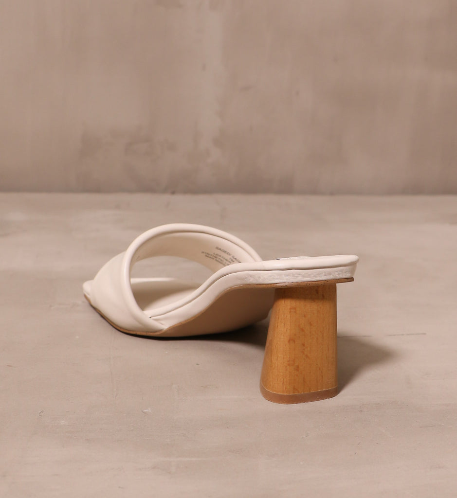 back of the wood heel and cream insole on the modern kinda gal heel