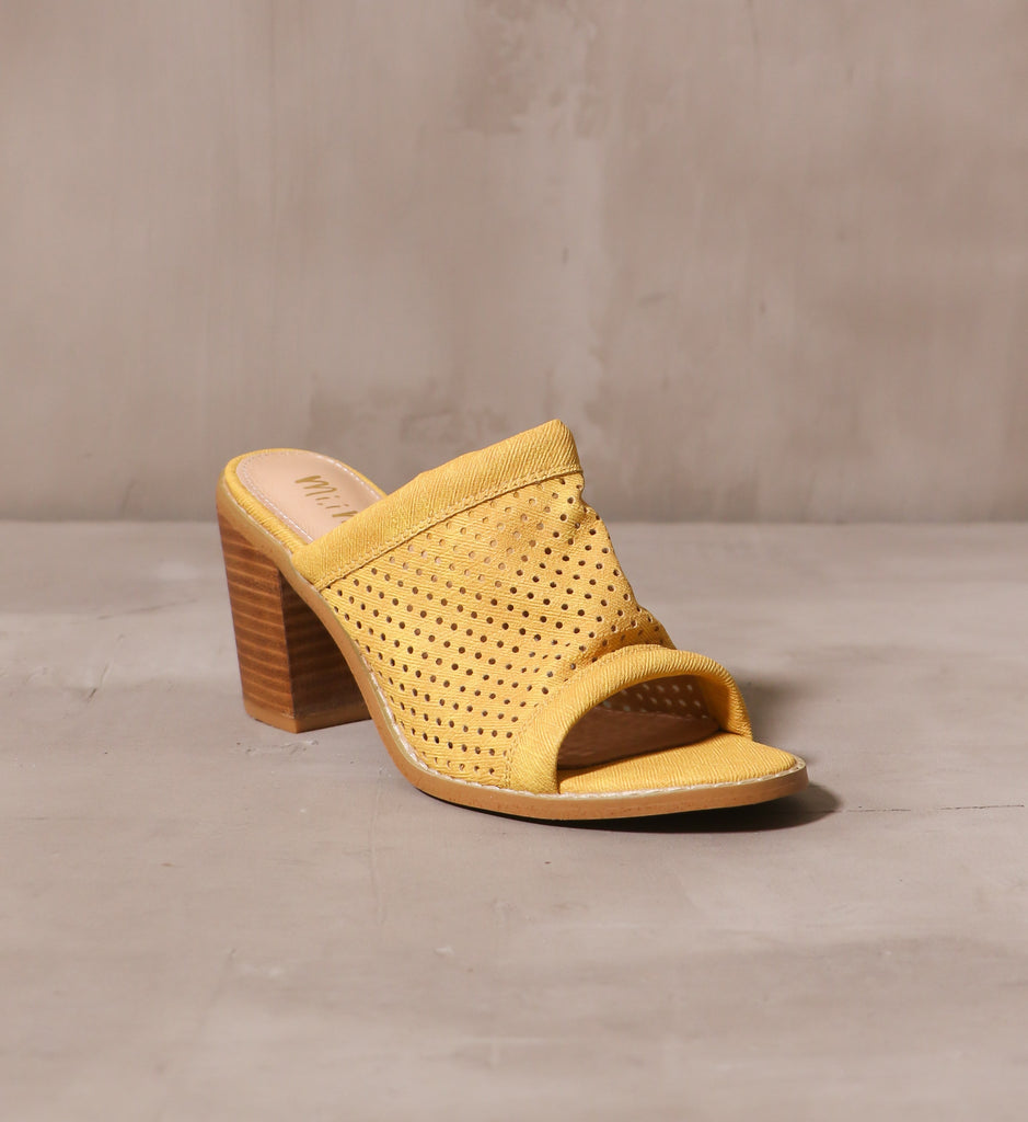 front of the open toe perforated canvas fabric upper on the sunshine state of mind heel