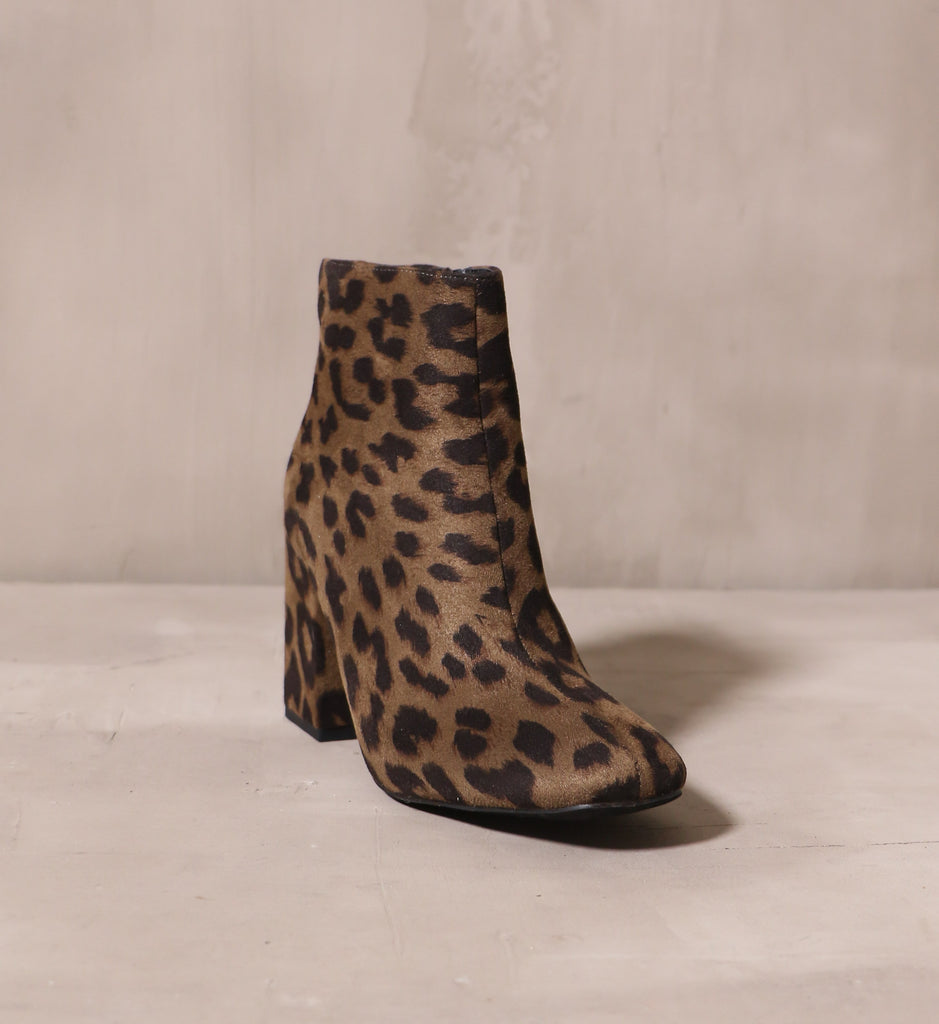 front of the square close toe and patterned upper on the cat's meow ankle boot