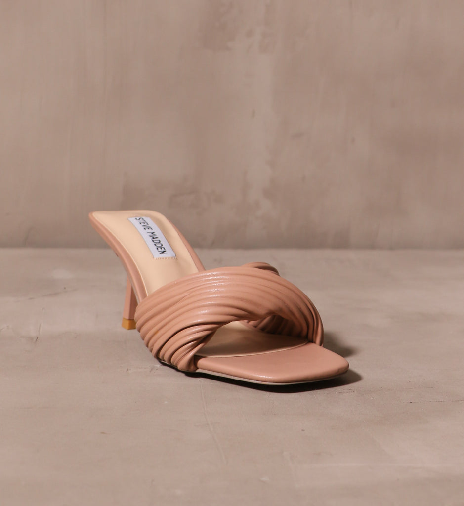 front of the square toe bed and puffy leather twisted strap across the bridge with tan insole