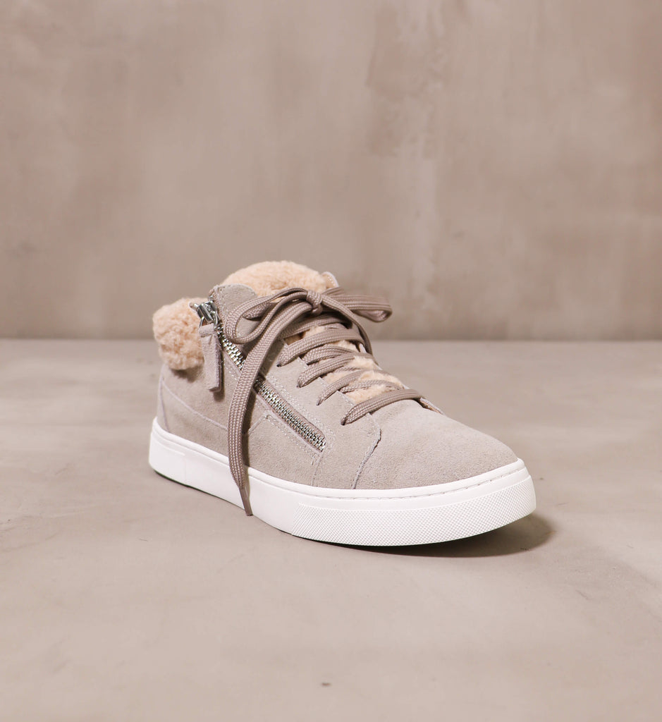 front of the round toe taupe suede warm feelings sneaker with chunky white rubber sole