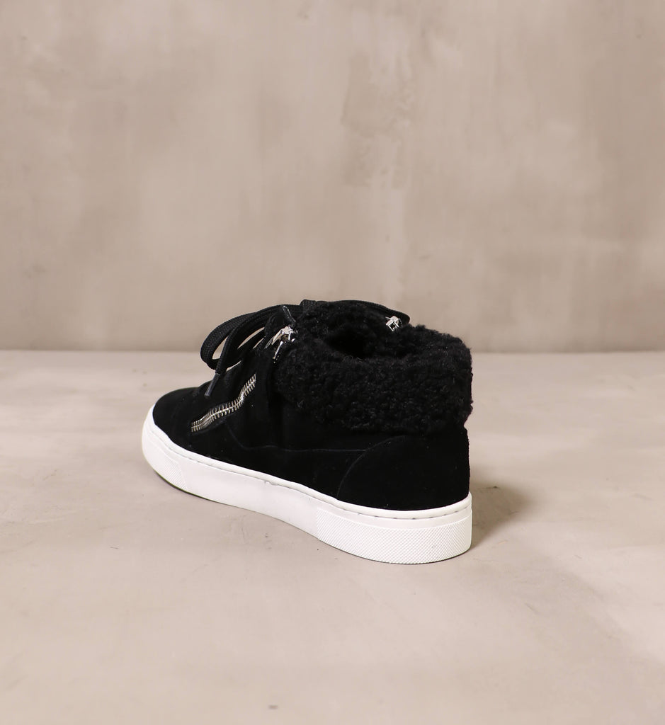 back of the suede and faux fur trim on the warm feelings sneaker
