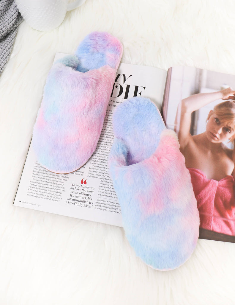 Fuzzy wuzzy rainbow slippers on furry rug with magazine - elle bleu shoes