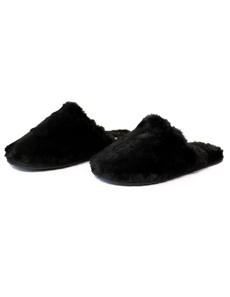 Closed toe faux fur fuzzy wuzzy slippers on white background 