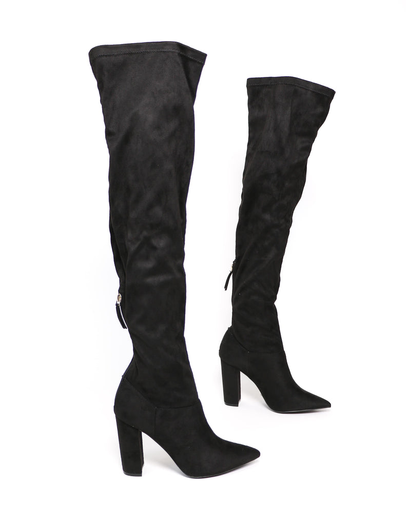 Black over the knee thigh's the limit boot on white background - elle bleu shoes