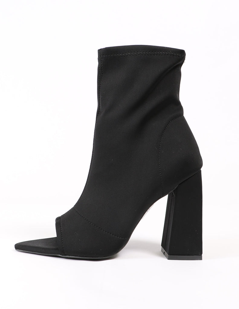 Side of the black sit tight bootie heel - elle bleu shoes