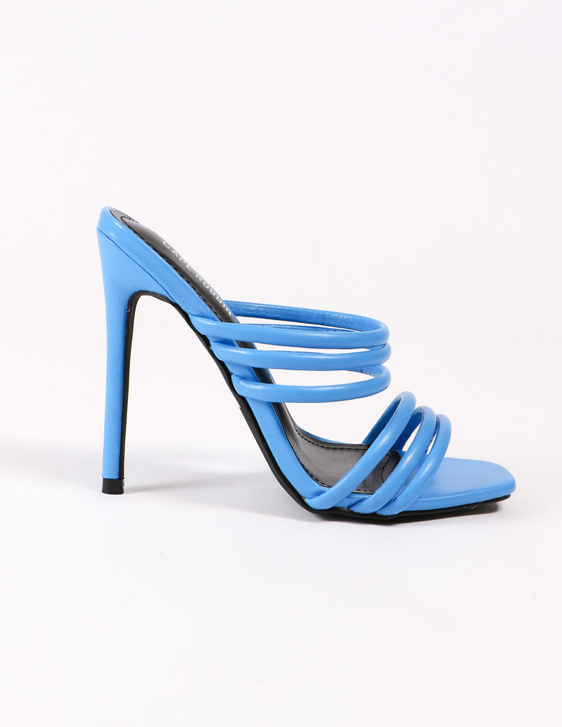 side view of the blue strappy heel on white background - elle bleu