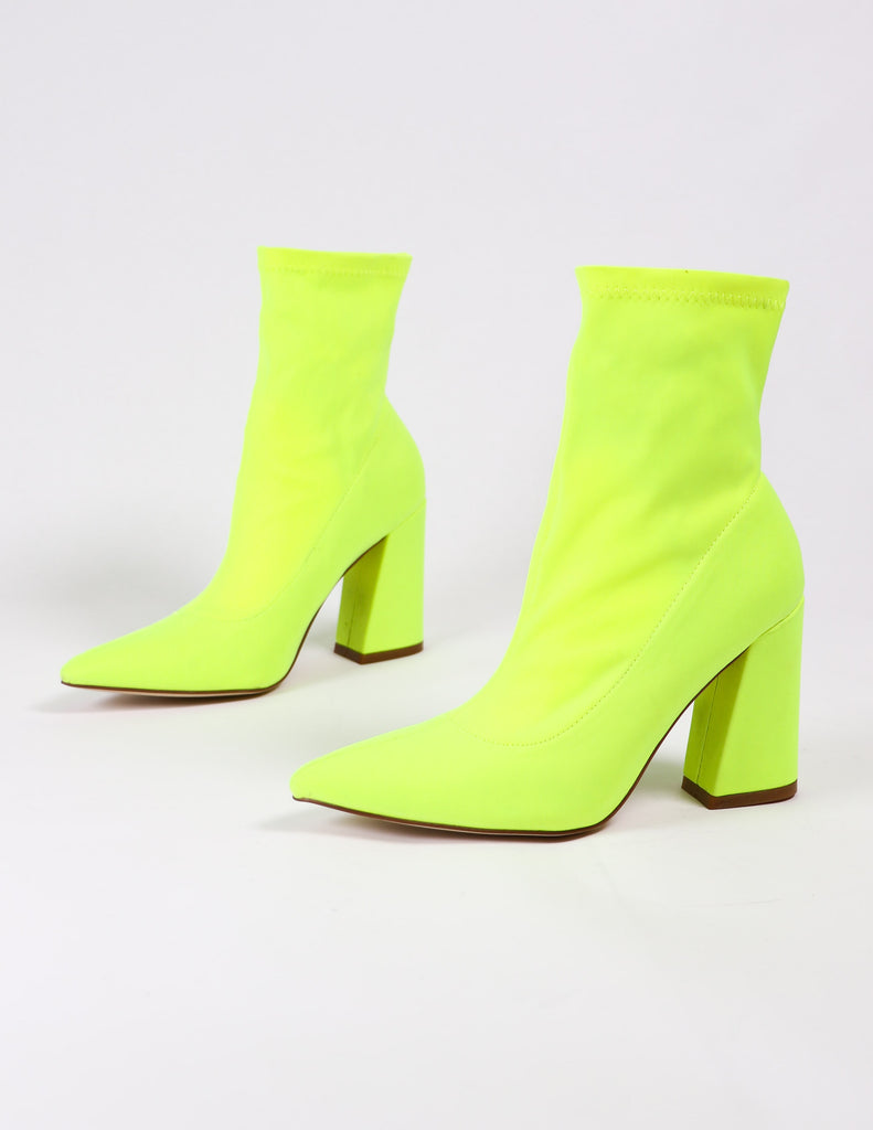 highlight of my life lime green booties on white background