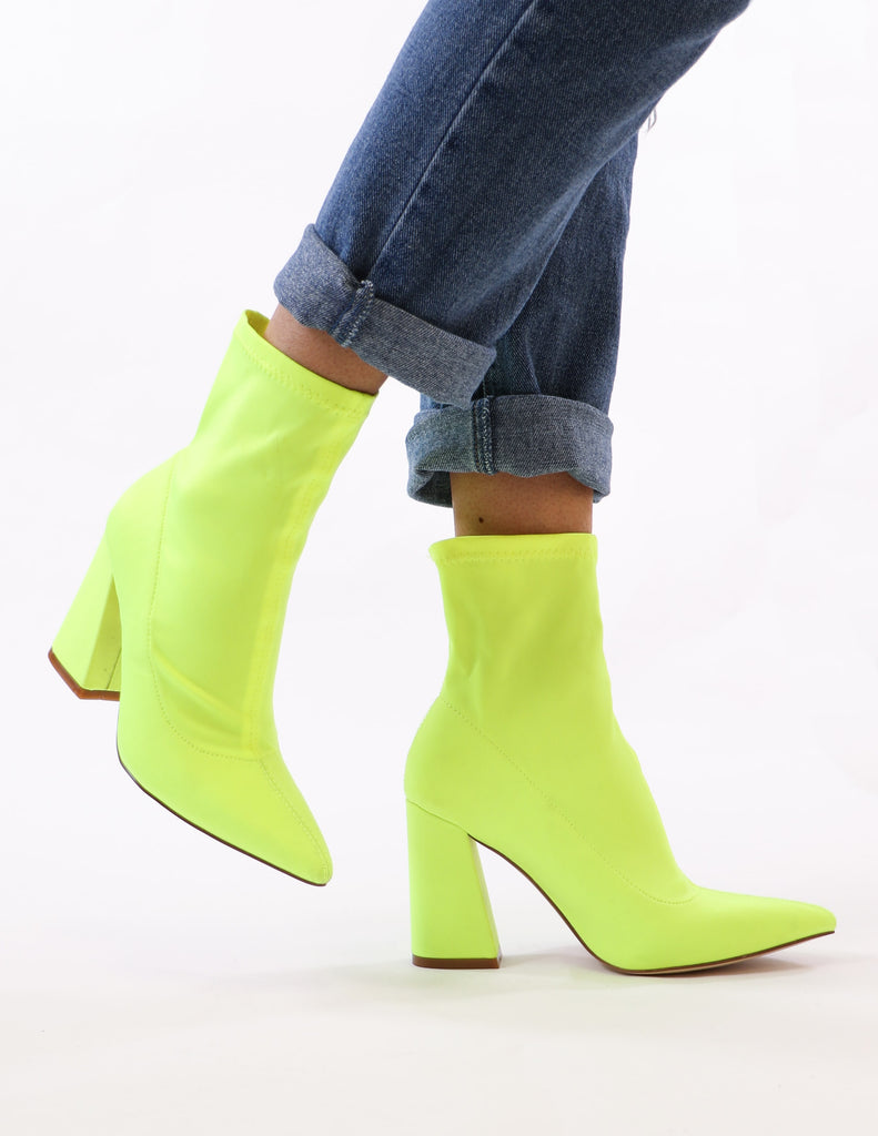 model standing in lime green highlight of my life bootie - elle bleu