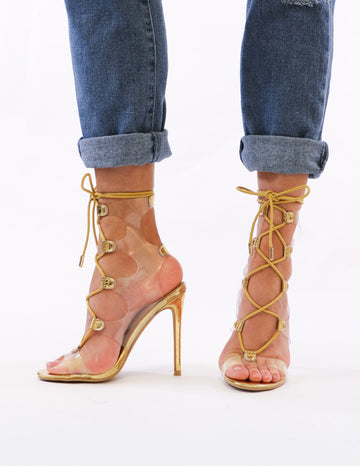 model standing in gold lace up heels - elle bleu shoes