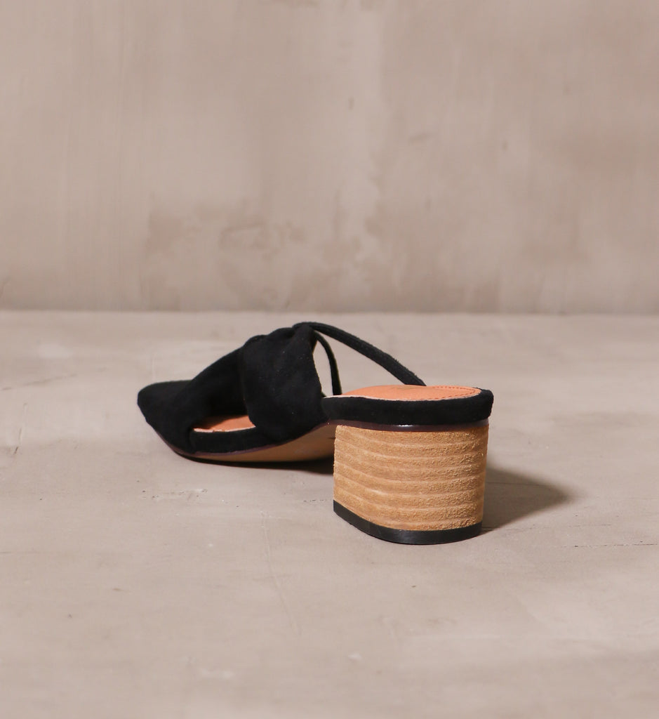 back of the stacked wood block heel on the black aesthetic emotions heel