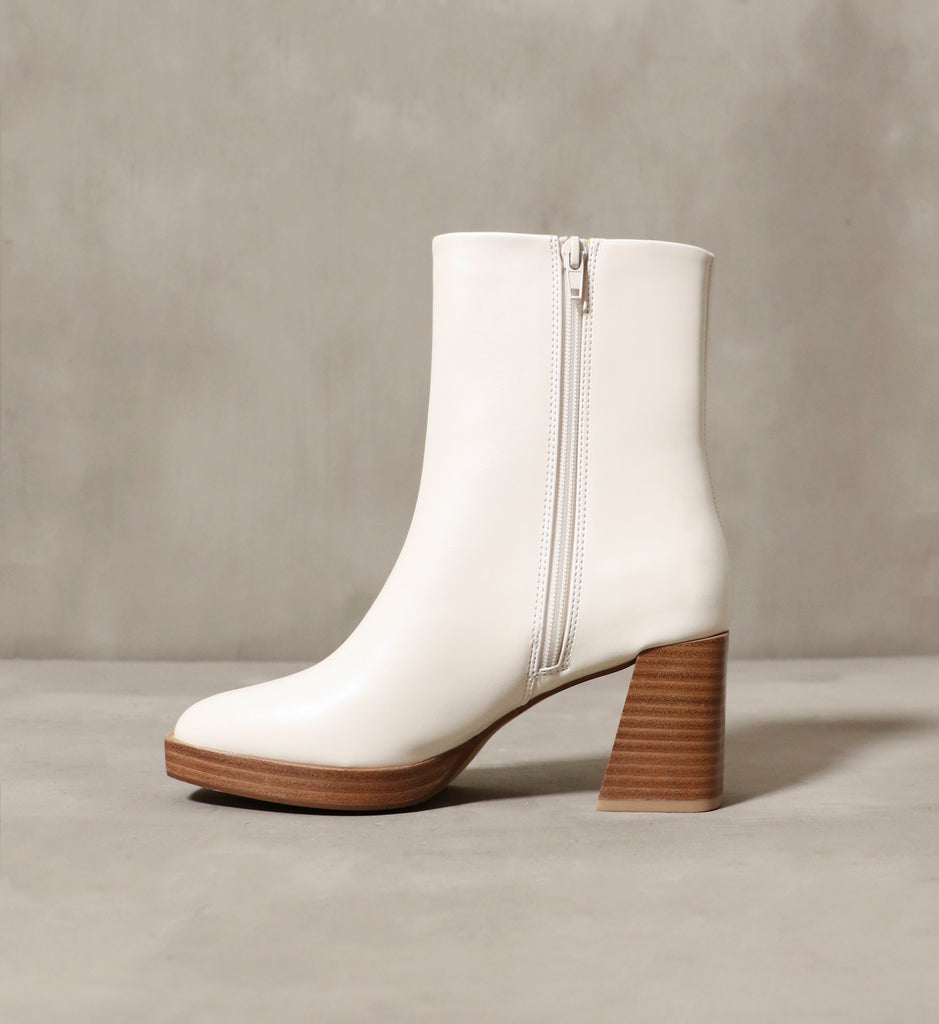The inner side of the Out on a High Bootie in cream with a zipper for easy on and off wear.