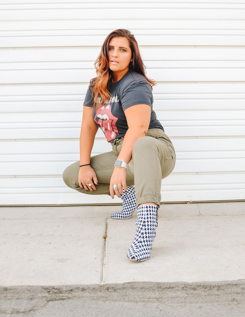 Model wearing menlee houndstooth bootie outside - elle blue shoes