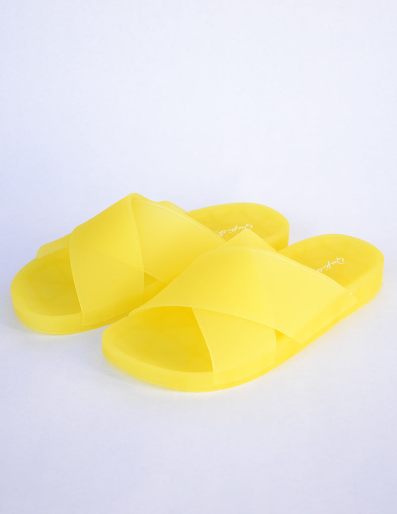 Yellow aquaholic slide sandal on white background