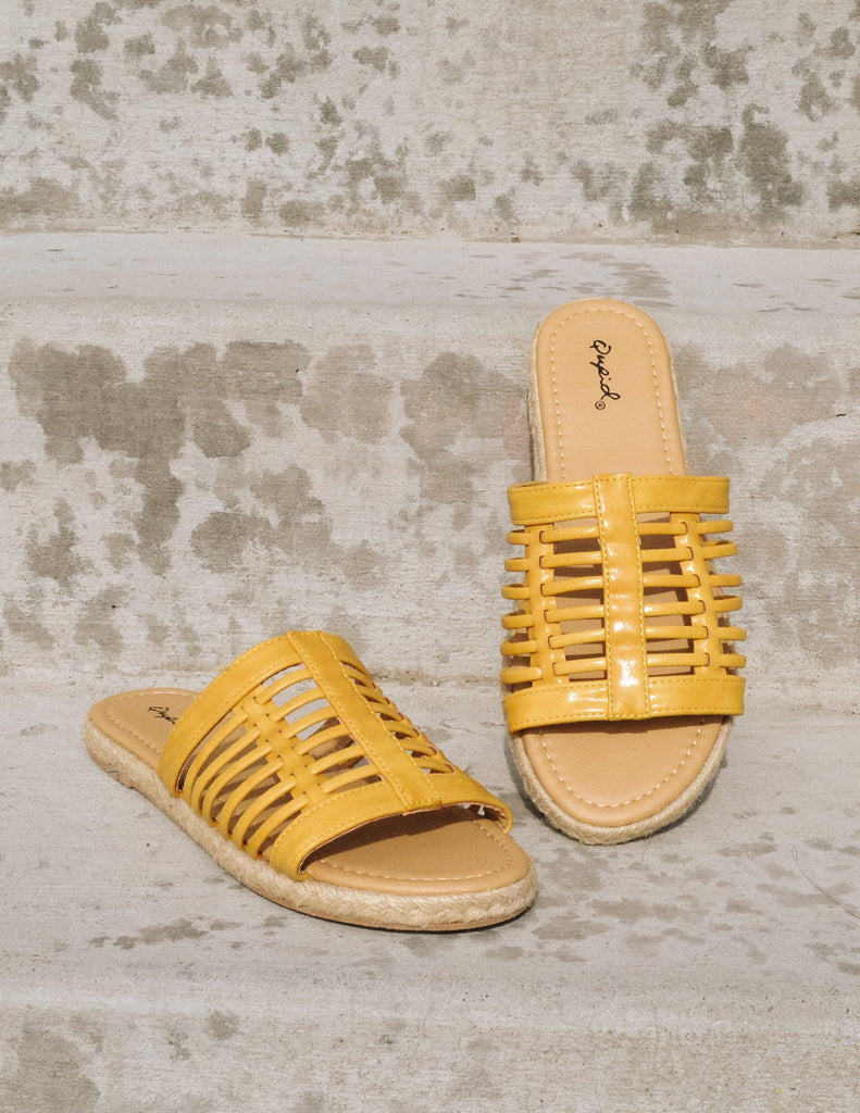 Yellow cage upper sandals with tan insole and rope wrapped sole