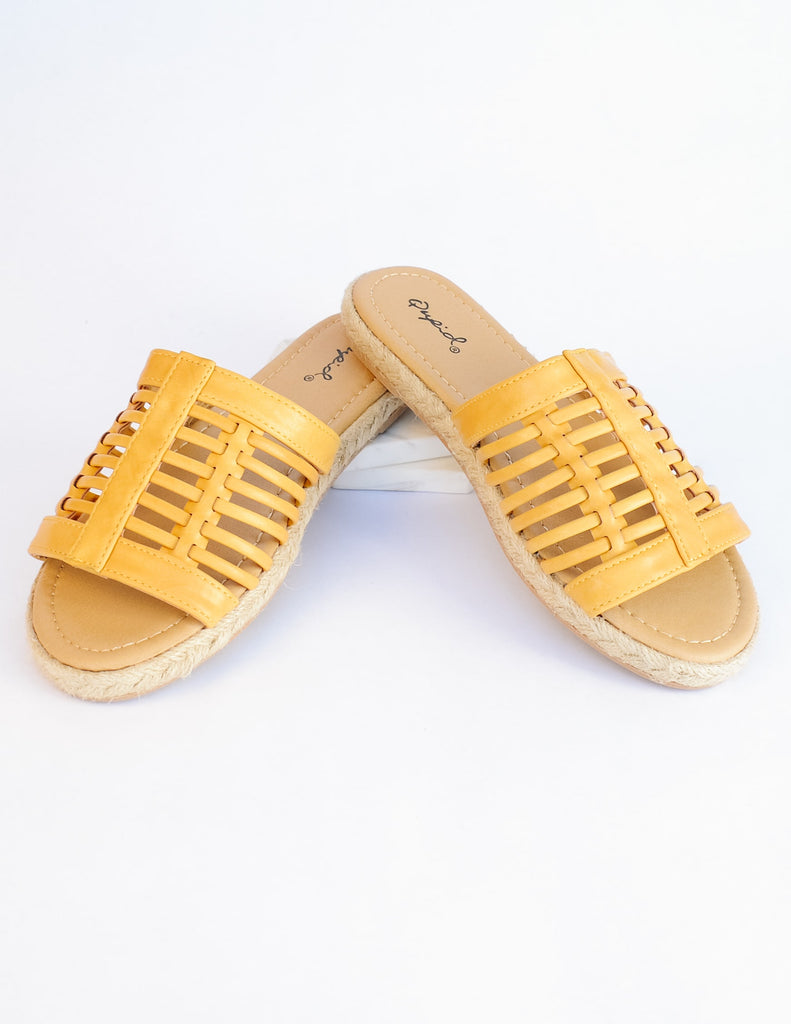 Mustard surf's up sandal with cage upper and tan insole on white background