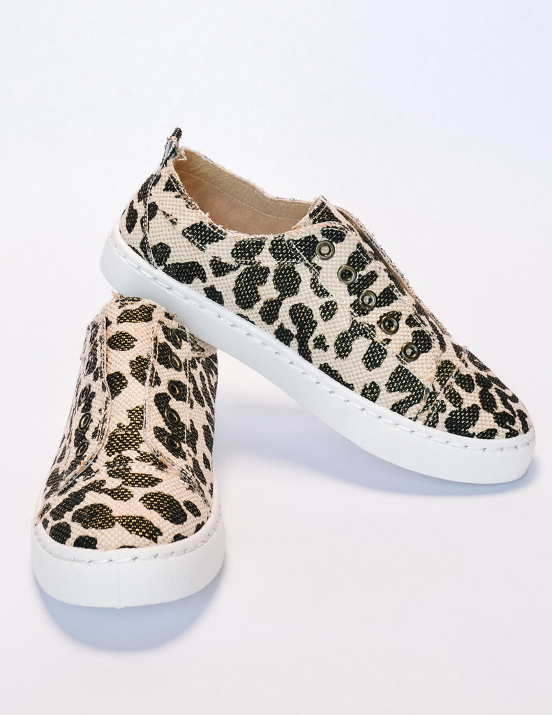 Get your sneak on sneaker in leopard stacked on white background