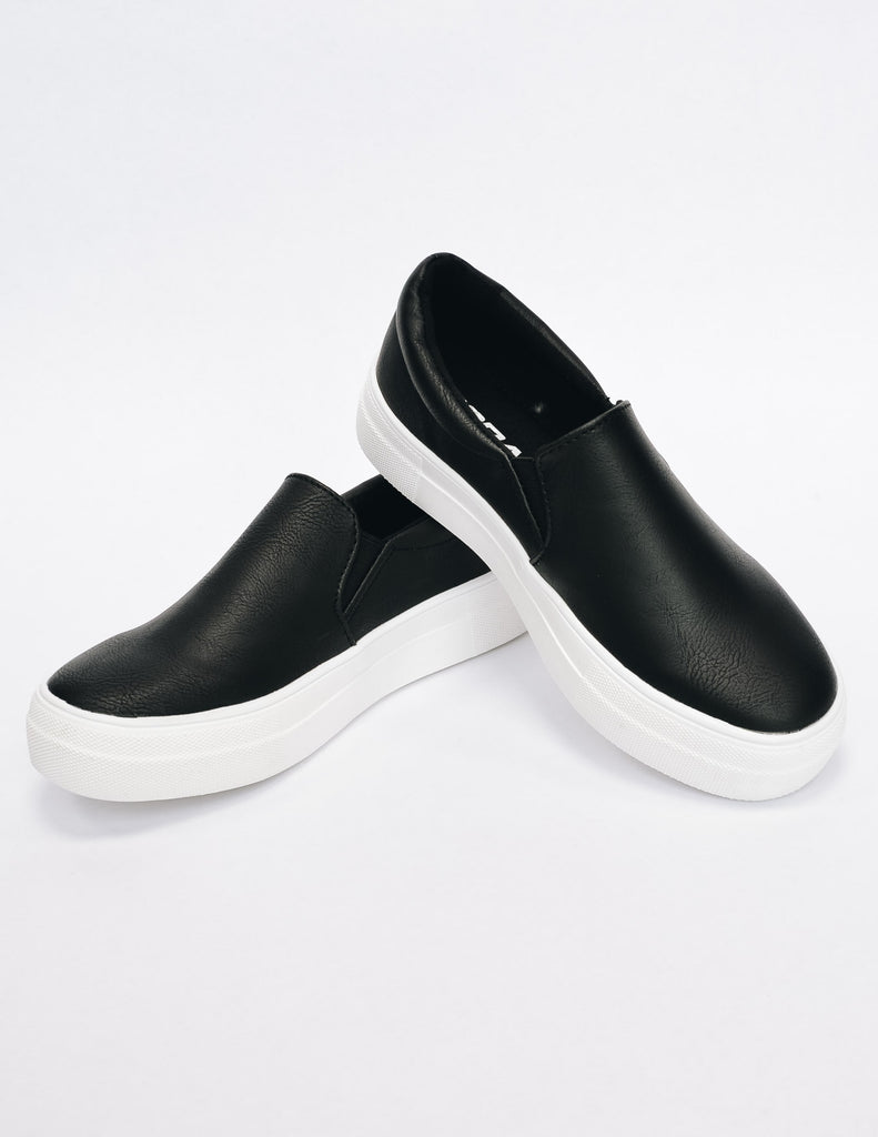 Black slip on sneaker with white rubber sole