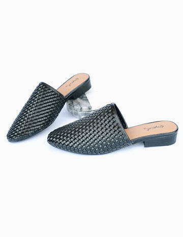 Black woven upper on black sole with tan padded insole on white background
