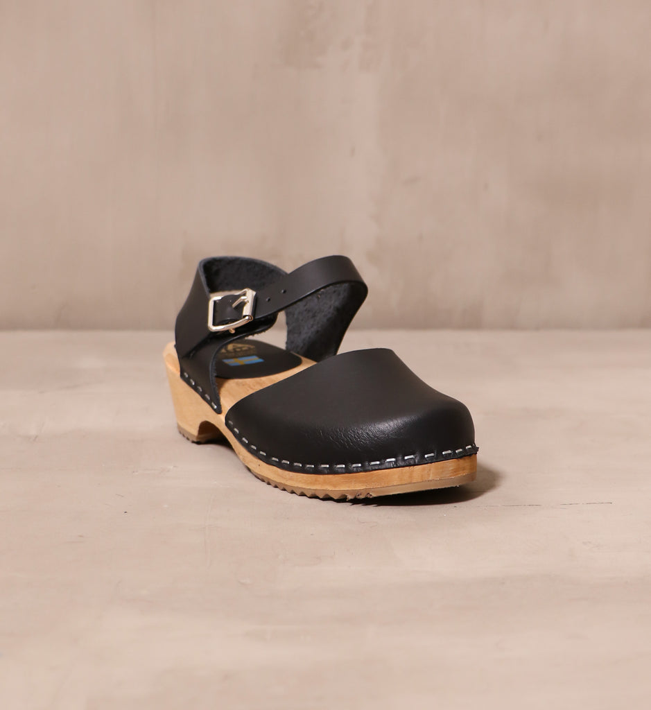the front of the every little step swedish clog in black.