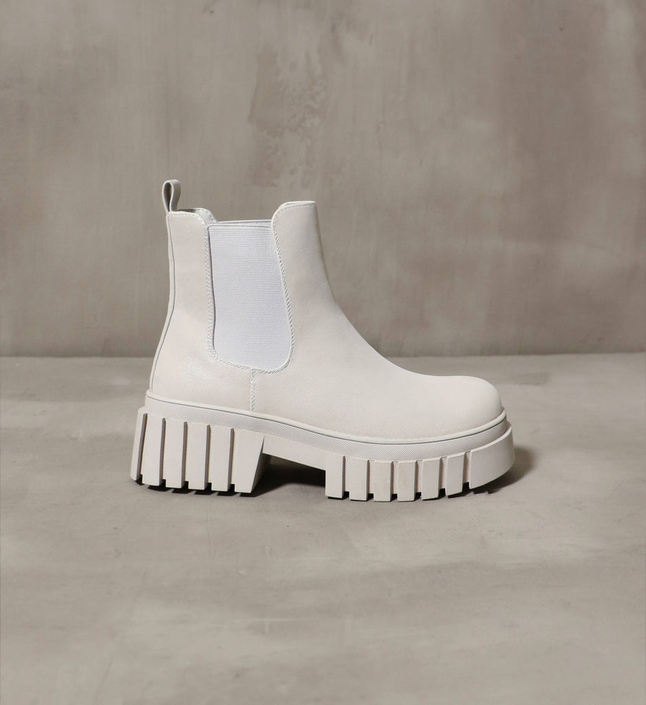 The side profile of the off-white Never a Sole Moment boot - Elle Bleu