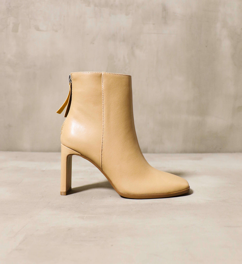 Natural colored heeled ankle boot with a zipper on the back - Elle Bleu