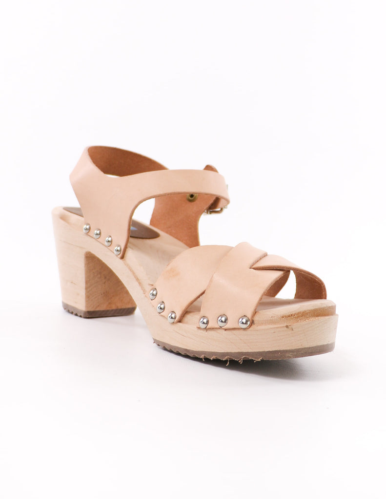 front of the mia need a lift clog in natural with criss cross leather straps and silver rivet details - elle bleu shoes