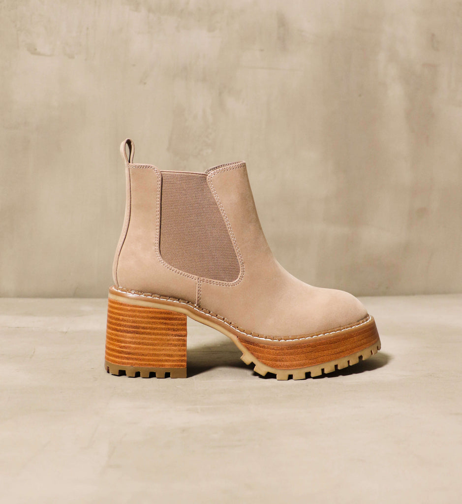The chelsea boot Sole Obsession in Stone set on a concrete background - Elle Bleu Shoes