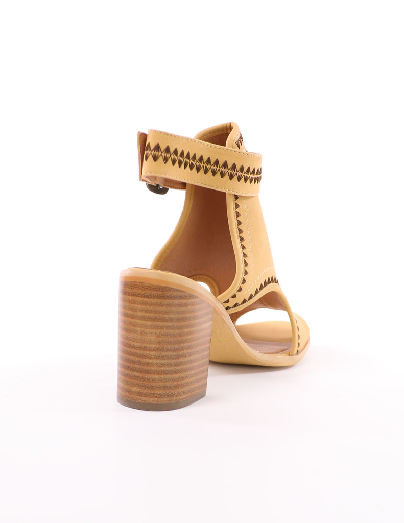 back of the volatile tan in all the right places odette heel with ankle strap and brown embroidery