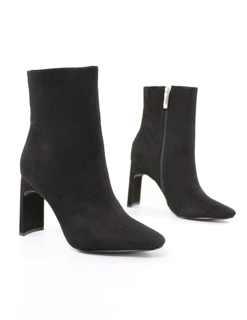 close up of the black faux suede and your point is ankle bootie - elle bleu shoes