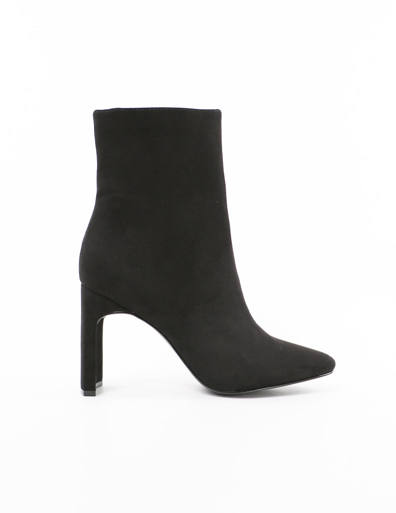 and your point is black faux suede ankle bootie on white background - elle bleu shoes