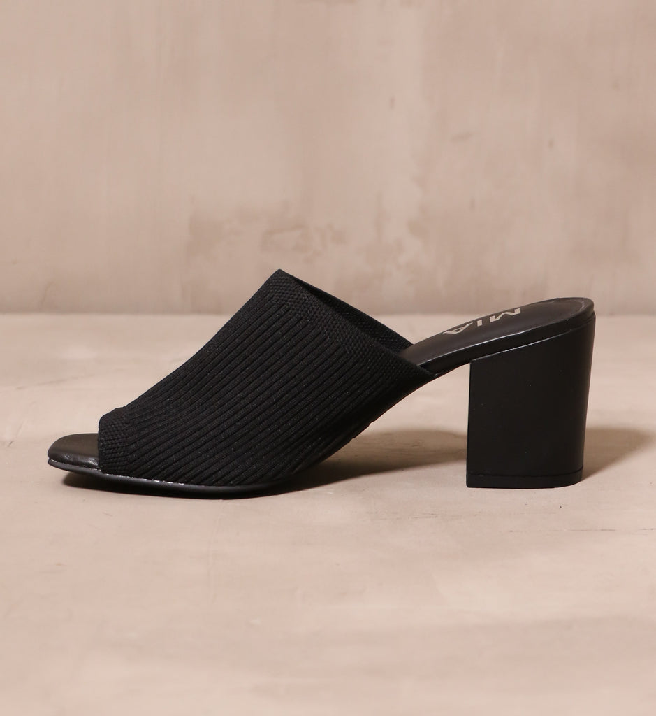 inner side of the open toe slip on mia scandinavian style textile sandal heel on cement background