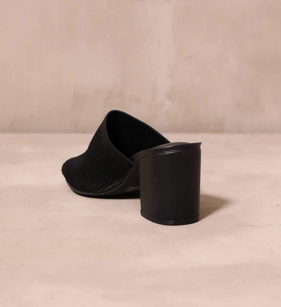 back of the vegan leather wrapped block heel on the scandinavian style textile sandal