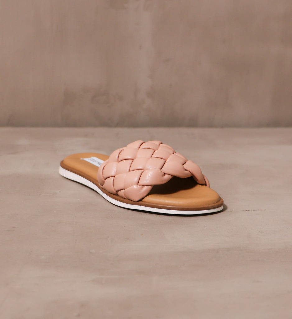 front of the open toe blush crush slide with tan leather insole and thick braided blush strap