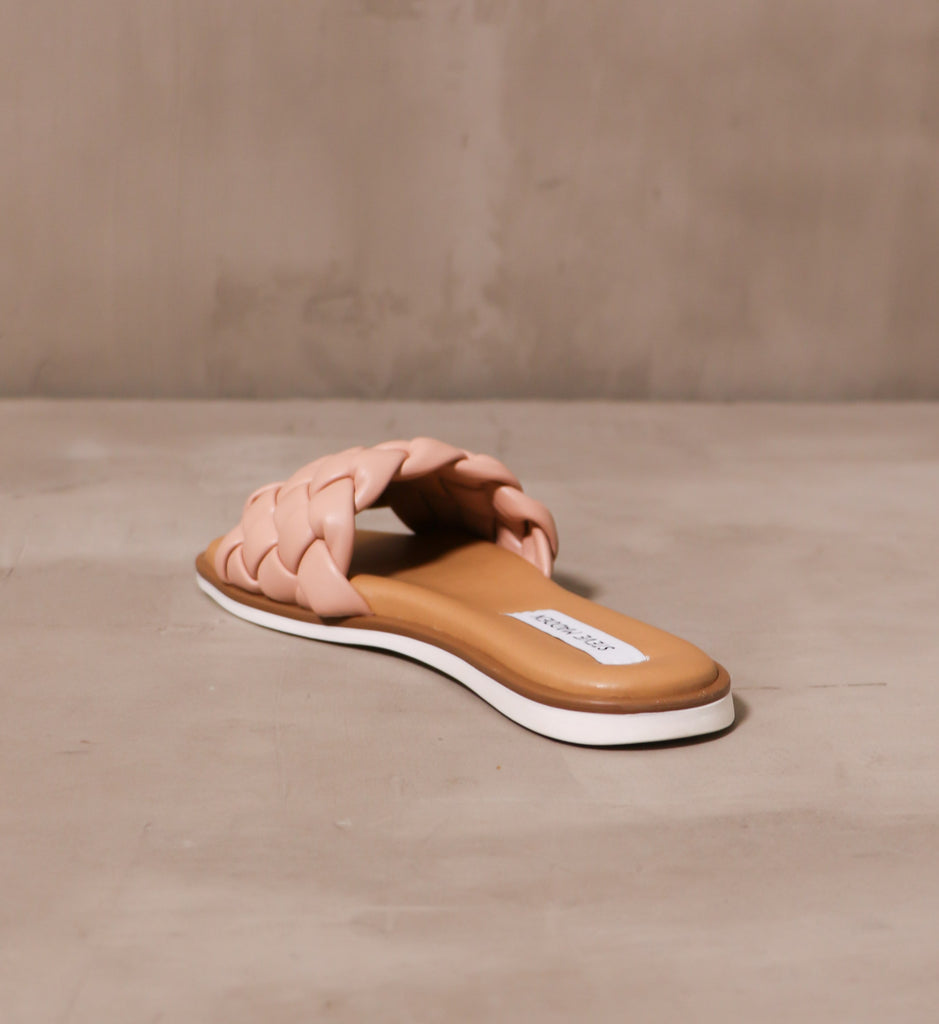 back of the blush crush slide with tan insole and white outsole
