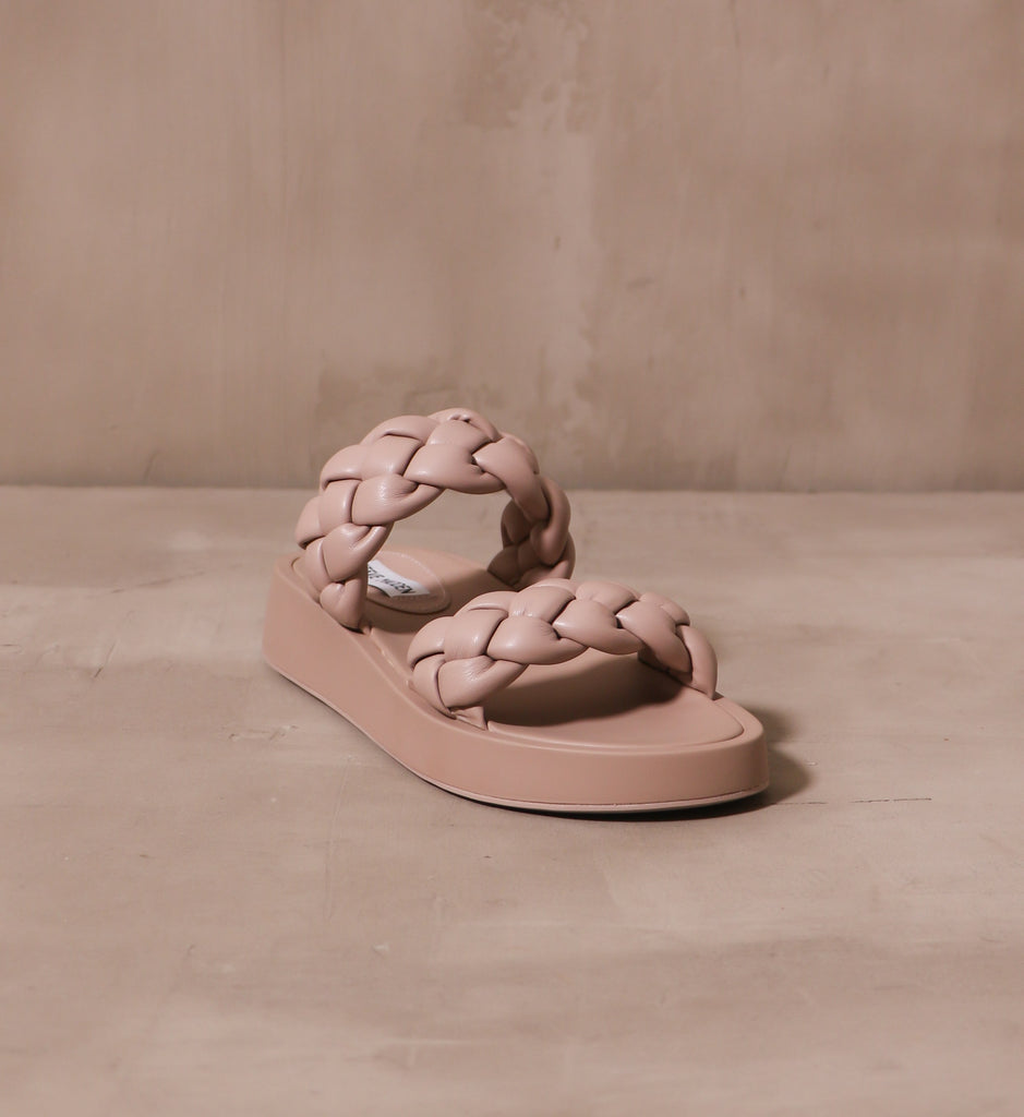 front of the open toe boldly braided platform sandal with two braided straps