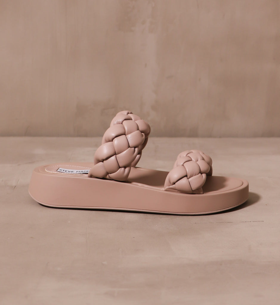 outer side of the boldly braided platform sandal with all over taupe color