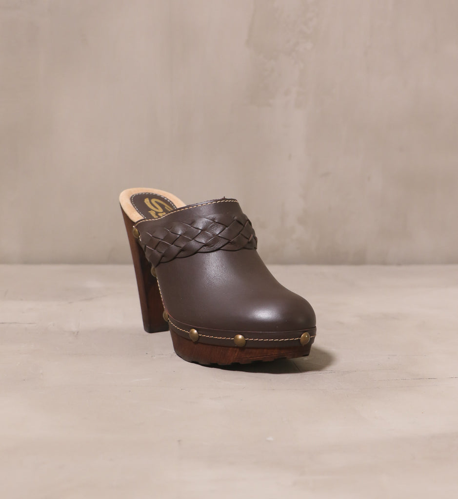 front of the round toe silhouette on the braid for you dark brown leather heel