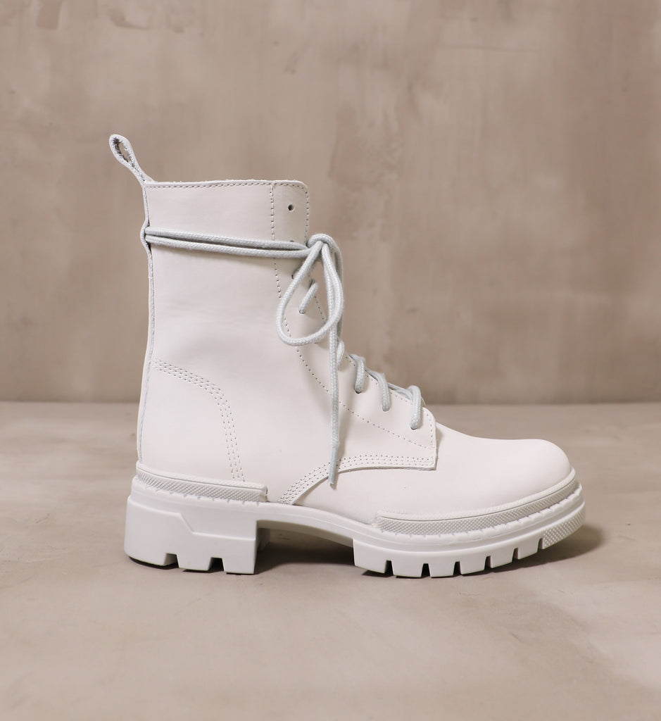 outer side of the light grey clean slate boot with wrap around laces and chunky rubber sole