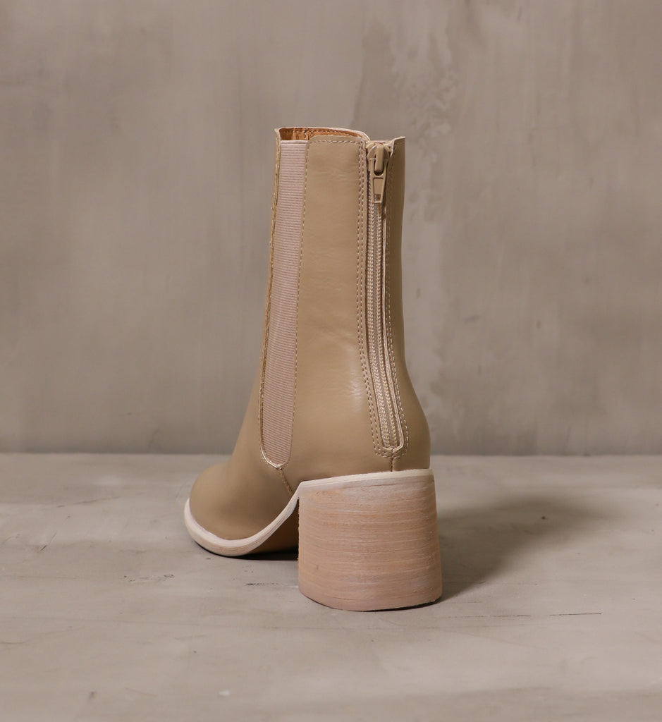 back zipper detail and stacked wood block heel on the consider it done boot