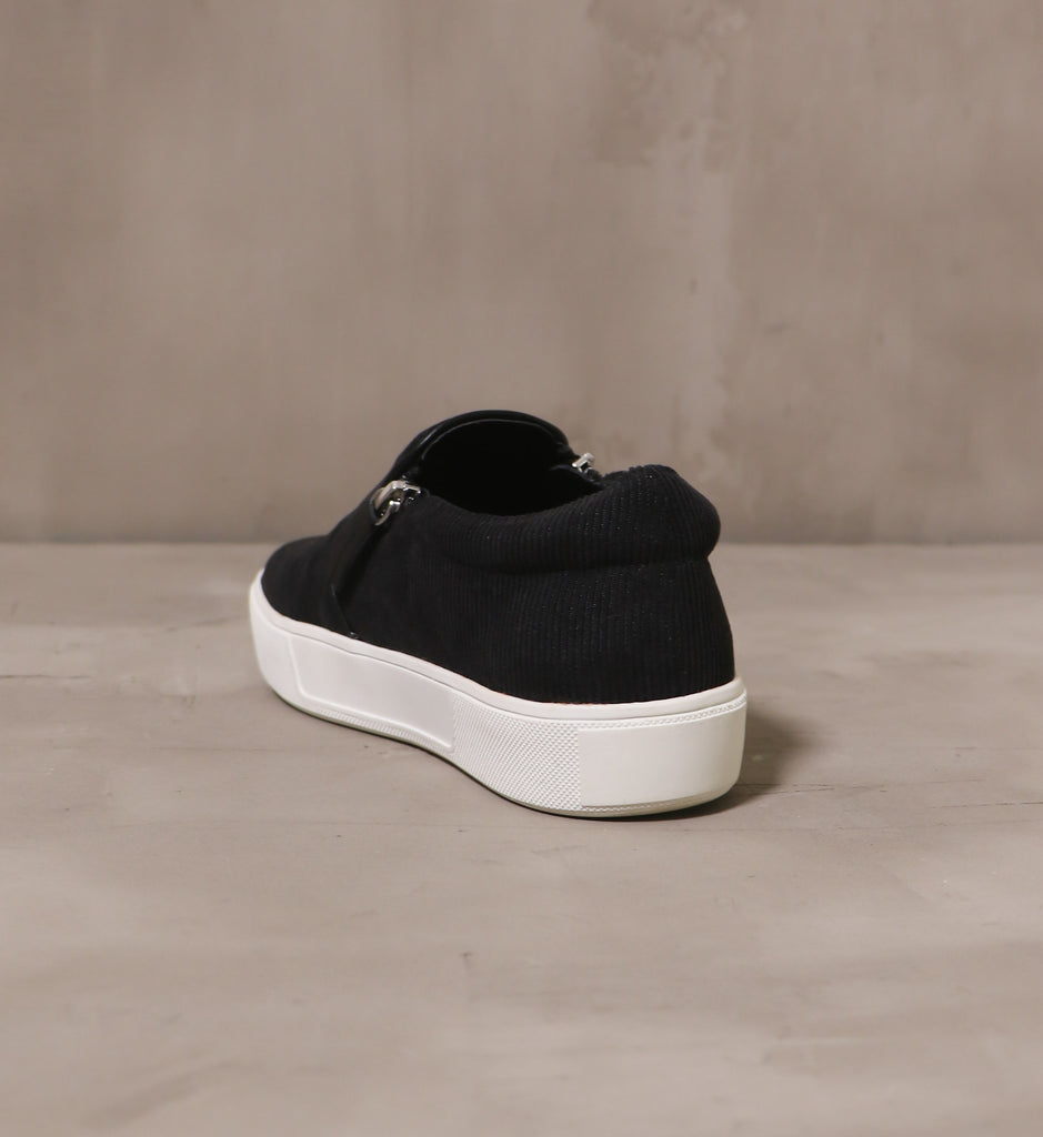 back of the slip on corduroy meets world sneaker with chunky white rubber sole