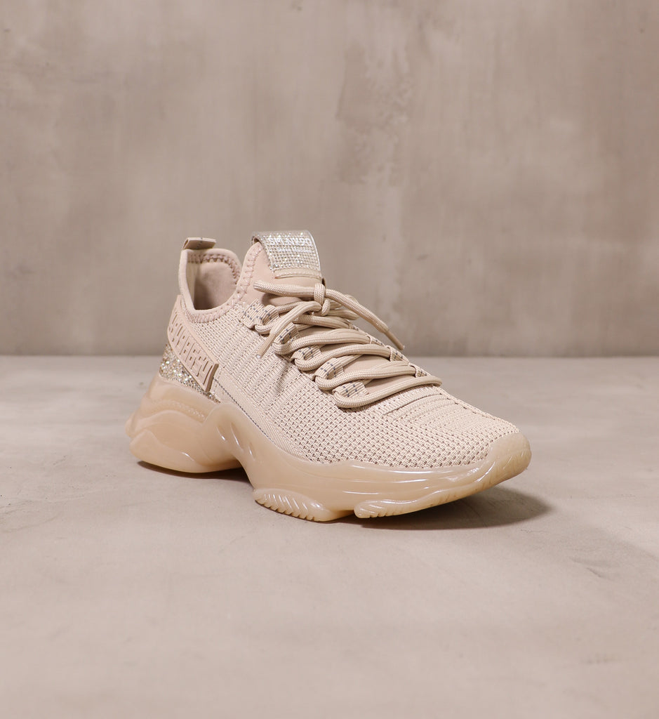 front of the chunky bubble rubber sole and fabric upper on the diamond in the blush sneaker