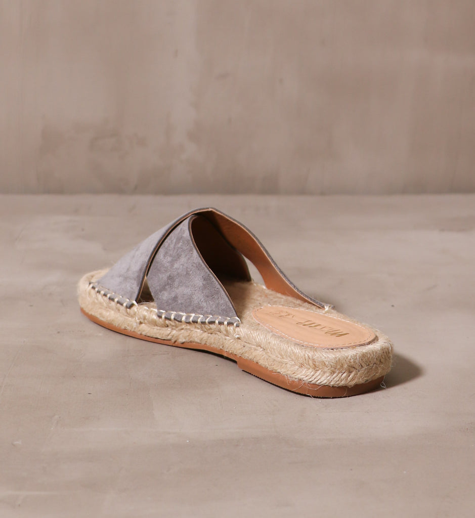back of the open back espadrille you go with me slide with leather heel pad on the insole of the esparto rope insole with gray straps