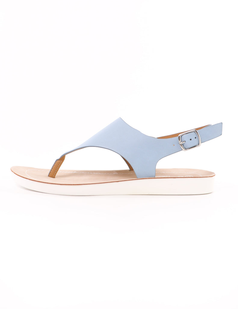side of the blue vegan leather slingback sandals with silver buckle detail and white bottom - elle bleu shoes