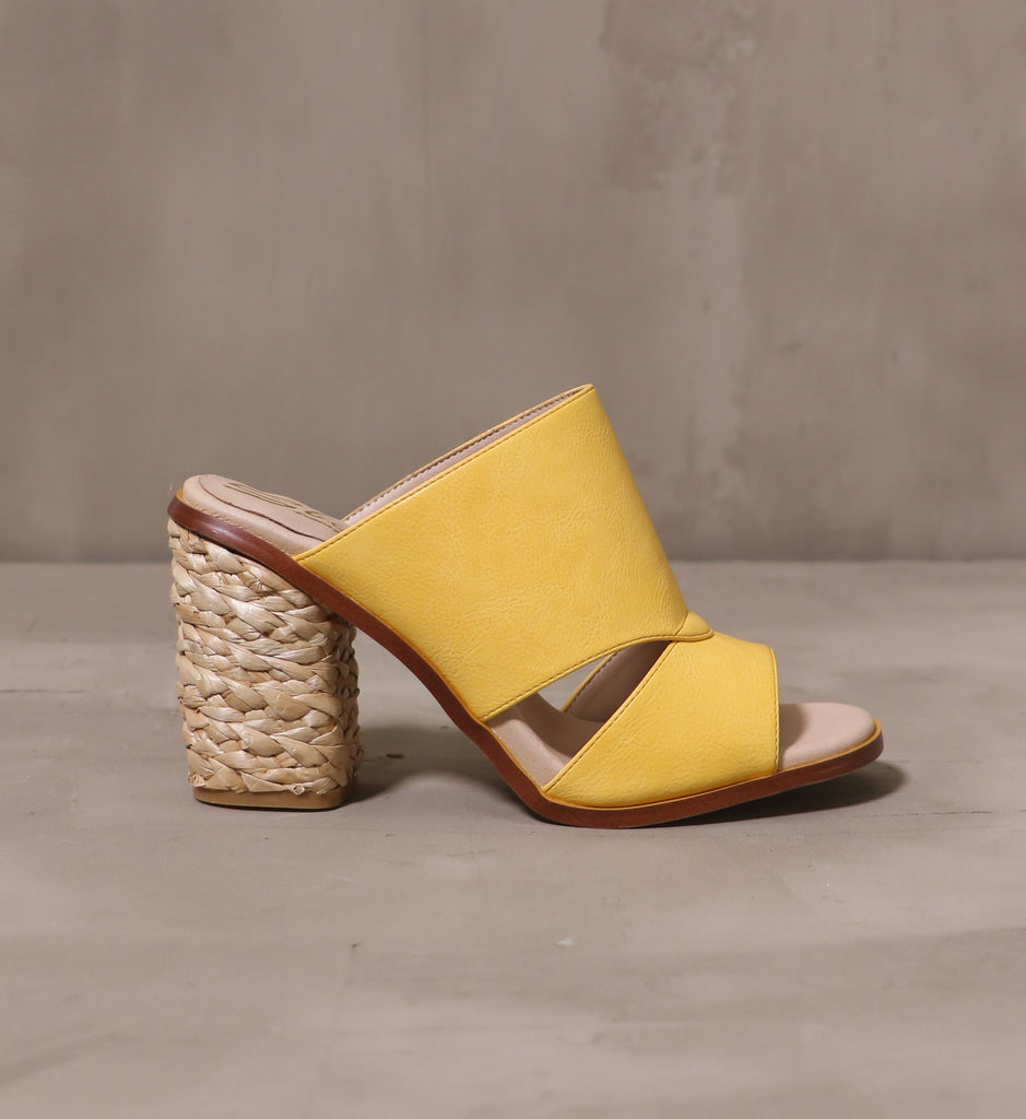outer side of the hello yellow heel with braided rope wrapped block heel